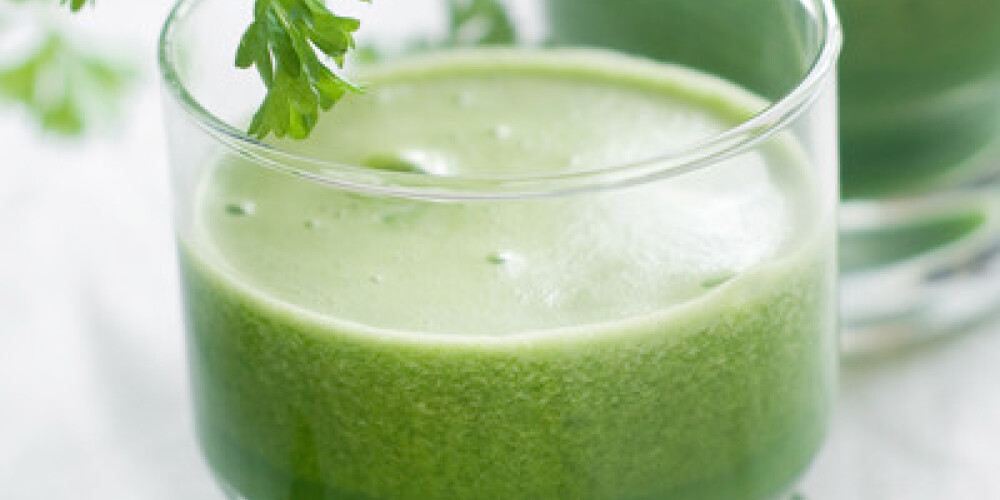 Green detox smoothie with cucumber, apple, spinach and selery, selective focus