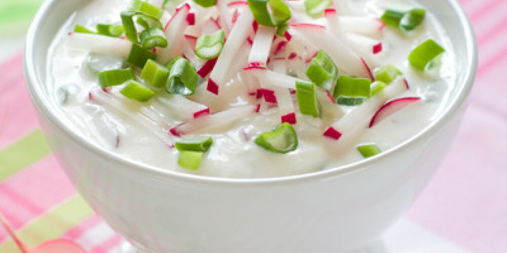 Salad with radishes and spring onions, selective focus