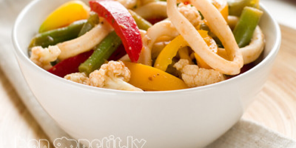 Wok stir fry with vegetables and squids, selective focus