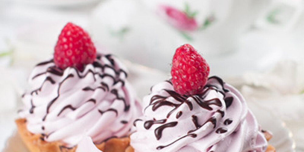 Cupcake with chocolate and raspberry, selective focus