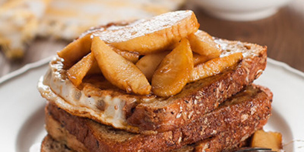 French toast with apple and maple syrup, selective focus