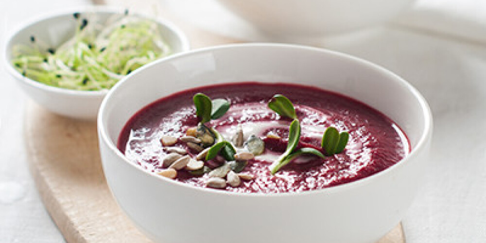 Vegetable cream soup with seeds, selective focus