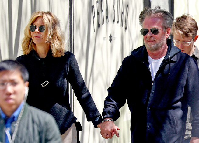 Mega Raiena un Džons Melenkamps.