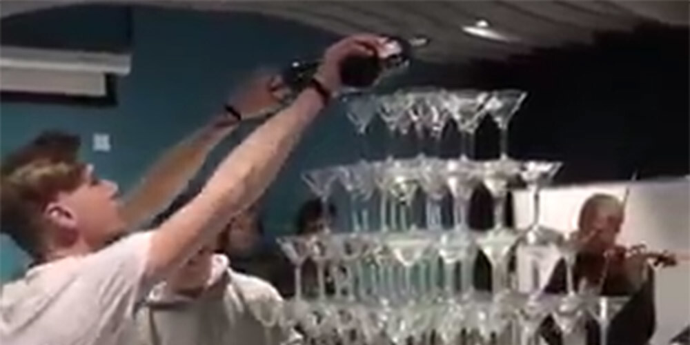 VIDEO: Krievijā bārmenis nejauši sagrauj šampanieša glāžu torni