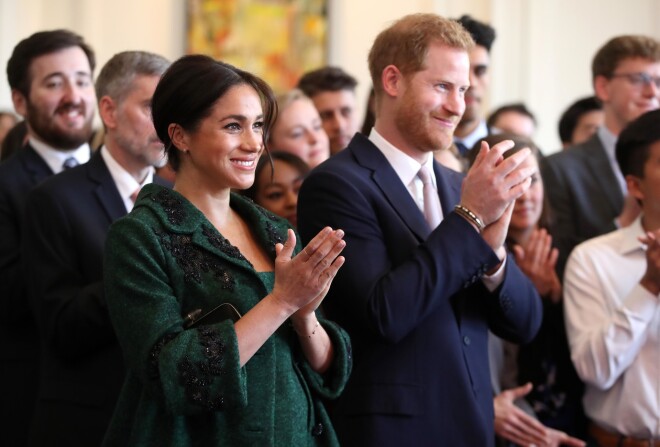Megana Mārkla un princis Harijs.