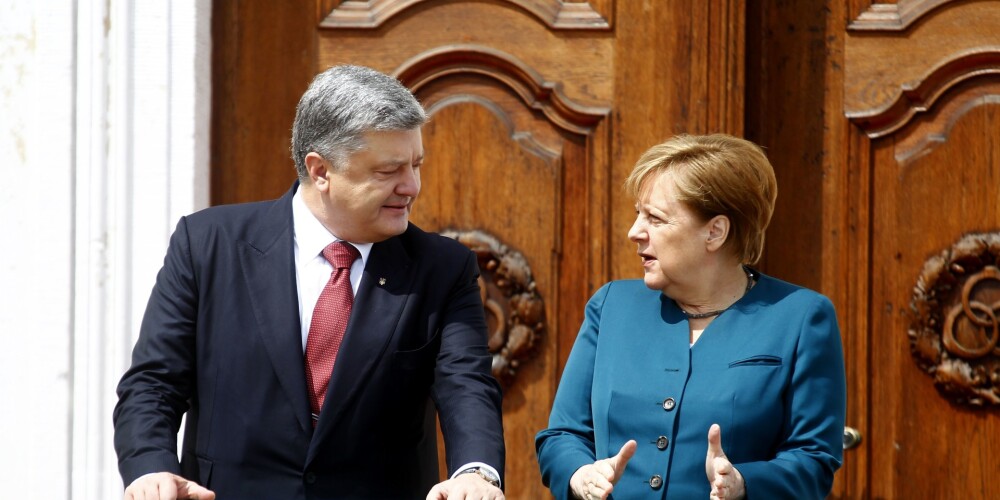 Par spīti aizrādījumiem par iejaukšanos Ukrainas prezidenta vēlēšanās, Merkele tiksies ar Porošenko
