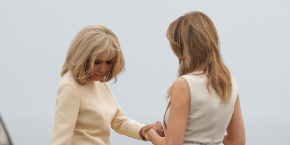 49-летняя Трамп на саммите показала плечи в платье Gucci, а 66-летняя Макрон - коленки в наряде Louis Vuitton