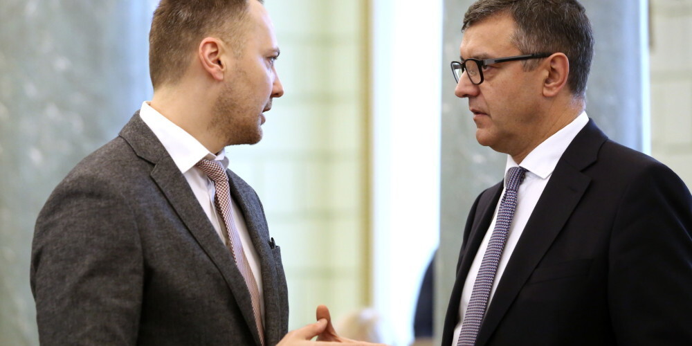 Министр внутренних дел Сандис Гиргенс и министр финансов Янис Рейрс