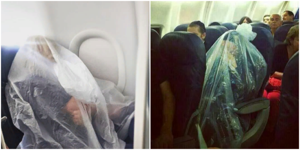 Пассажиры самолета кутаются в полиэтилен, чтобы спастись от коронавируса