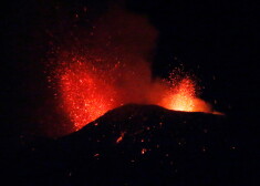 Eruptions from Mount Etna light up the sky during the night in Catania, Italy, December 14, 2020. Picture taken December 14, 2020. REUTERS/Antonio Parrinello