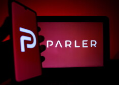 epa08931438 A photo illustration shows the logo of Conservative social media application (app) Parler on a computer and mobile telephone screen, in Paris, France, 11 January 2021. Parler, widely used by conservatives and supporters of US president Donald Trump, has gone offline after Amazon terminated its web hosting services for the app - which comes after Google and Apple blocking it from their online application stores, in response to the threatening  content shared on the platform. In the aftermath of the 06 January mob attack on the US capitol building, it has been determined that threatening rhetoric had been shared on the Parler platform inciting violence in the lead-up to that day.  EPA/IAN LANGSDON