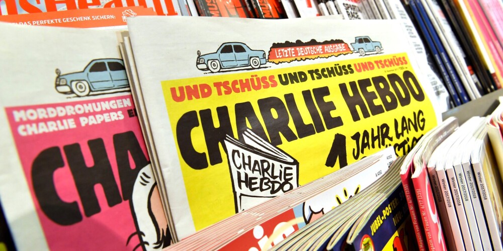 Satīras žurnāls "Charlie Hebdo" sadusmo britus, publicējot karikatūru ar Elizabeti II