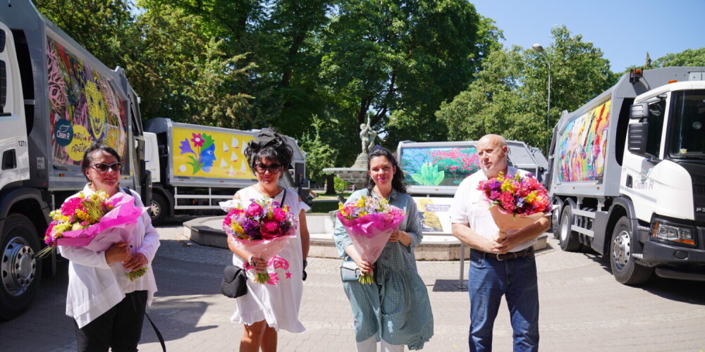 Четыре латвийских художника украсили мусоровозы Clean R