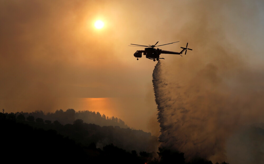 In Greece, eight people have been affected by forest fires and sixteen by heat waves.  PHOTO