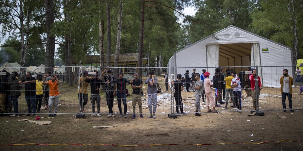 Migranti uz Lietvas-Baltkrievijas robežas.