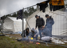 Migranti uz Lietuvas robežas.