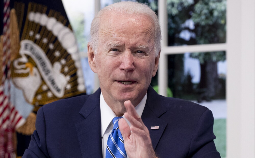 Biden urges Americans not to panic about the omicron