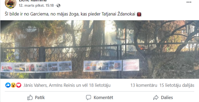 12. martā sociālos tīklos publicēja fotogrāfijas no Ždanokas mājas žoga Garciemā, kuri bija “izrotāti” ar Krievijas agresiju nosodošiem plakātiem.