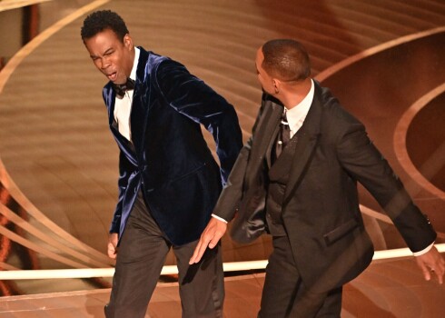 Will Smith appears to strike Chris Rock