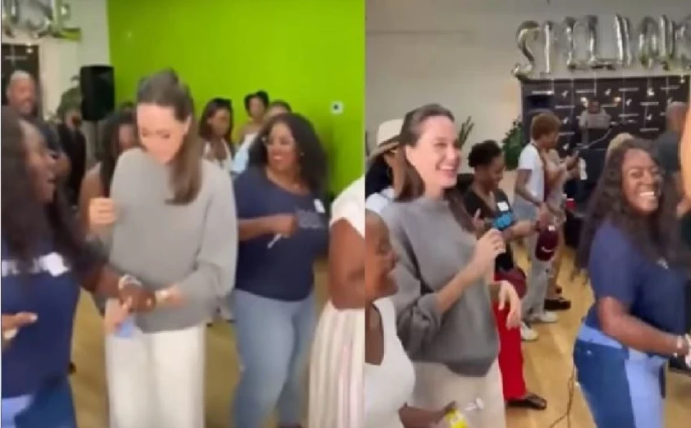 We have never seen him like this!  Guests filmed Angelina Jolie dancing at a closed party