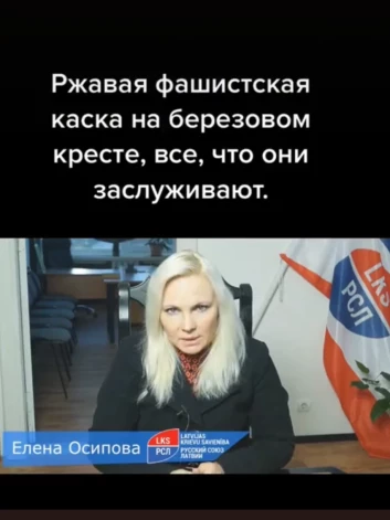 Елена Осипова за снос памятника в Лиепае грозит березовым крестом и ржавой каской. (Фото: скриншот TikTok)