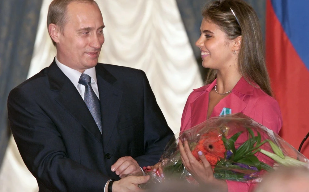 A midwife who gave birth to Putin’s alleged lover has died under mysterious circumstances in Switzerland