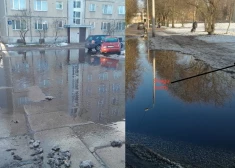 Дорога и тротуар, ведущие к главному входу в учебное заведение, затоплены. (Фото: скриншот видео TV3)