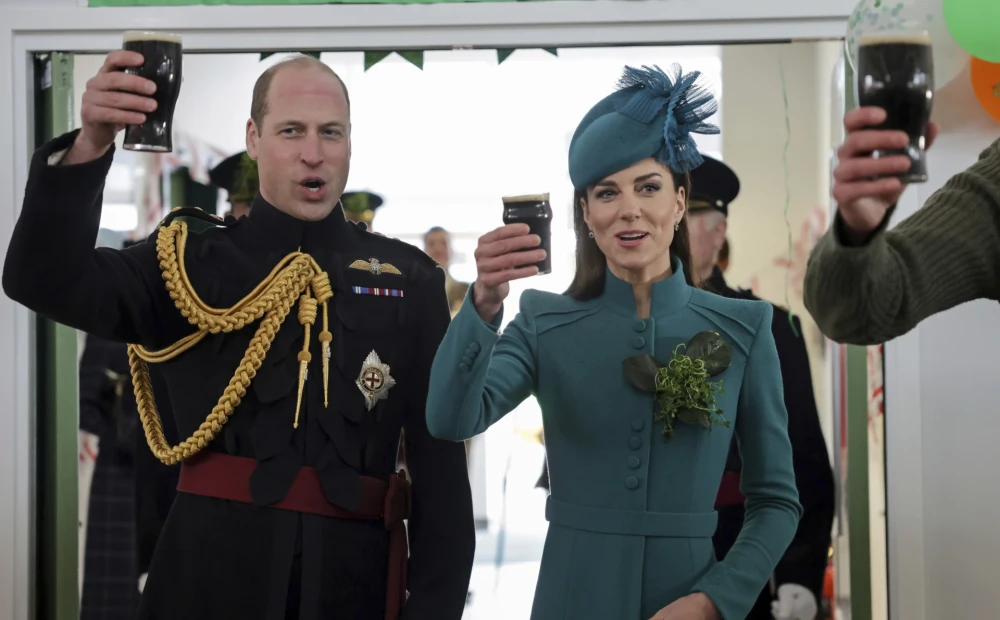 Kate and William are seen drinking beer in a photo.