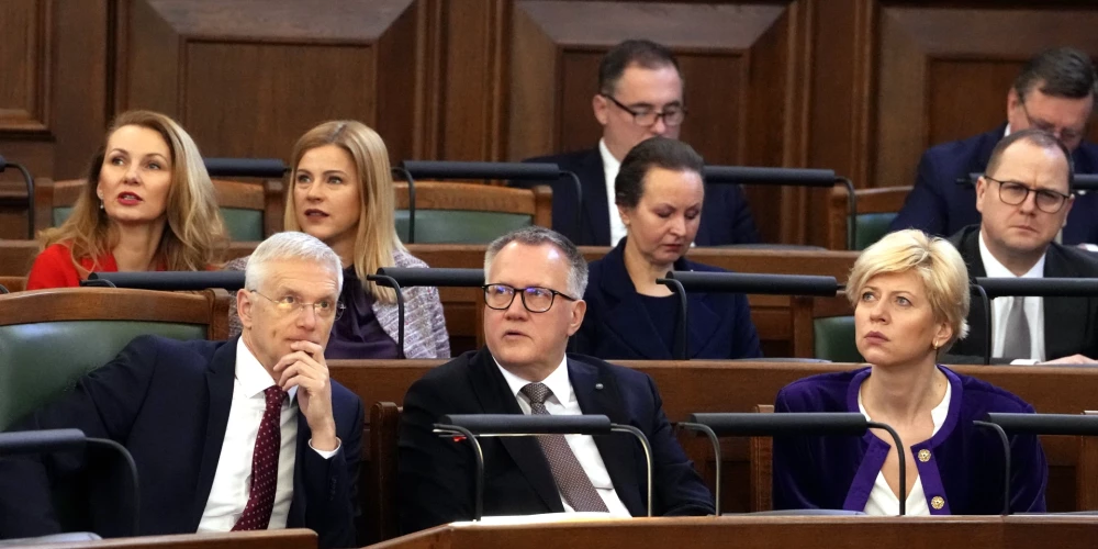Премьер-министр Кришьянис Кариньш и министры возглавляемого им правительства на заседании Сейма