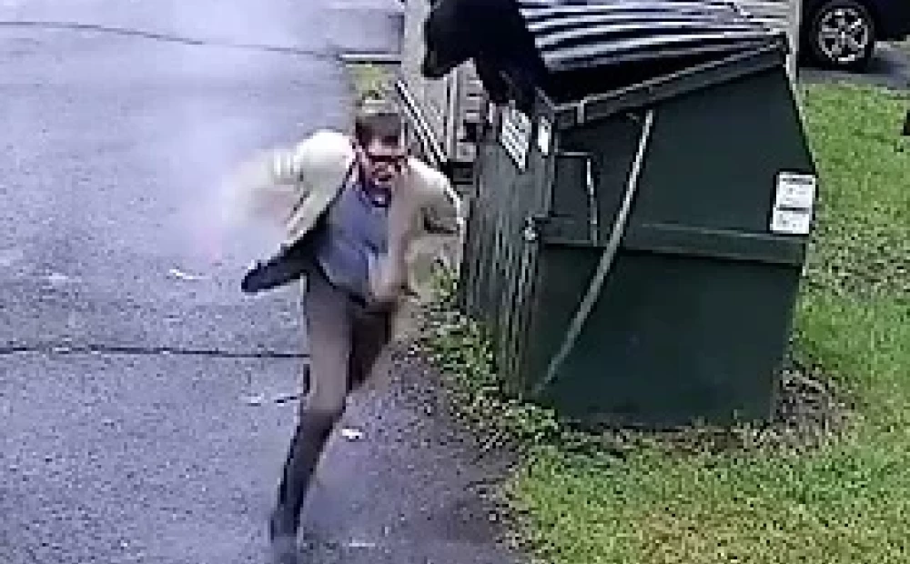 “Bear surprises school principal by popping out of garbage can in West Virginia”