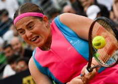 Latvia's Jelena Ostapenko returns to Russia's Daria Kasatkina during their round of 16 match of the Women's WTA Rome Open tennis tournament on May 15, 2023 at Foro Italico in Rome. (Photo by Andreas SOLARO / AFP)