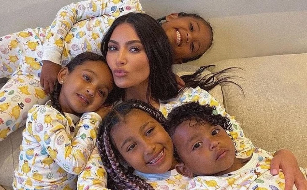 “Kim Kardashian Opens Up about Challenges of Raising Four Children”