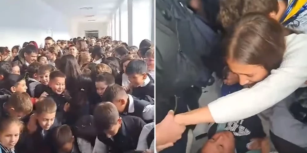 На кадрах видна толпа детей в школьной форме. Многие кричат и плачут.