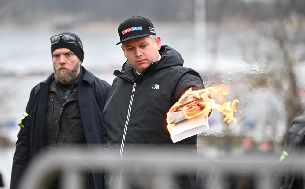 Man Punished for Burning Bacon-Wrapped Koran with Offensive Note Outside Swedish Cathedral