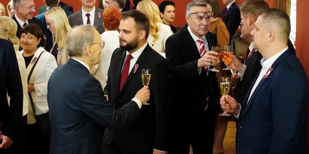 Депутаты Сейма.