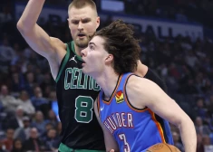 Oklahoma City Thunder guard Josh Giddey (3) drives against Boston Celtics center Kristaps Porzingis (8) during the first half of an NBA basketball game, Tuesday, Jan. 2, 2024, in Oklahoma City. (AP Photo/Nate Billings)  OKNB113