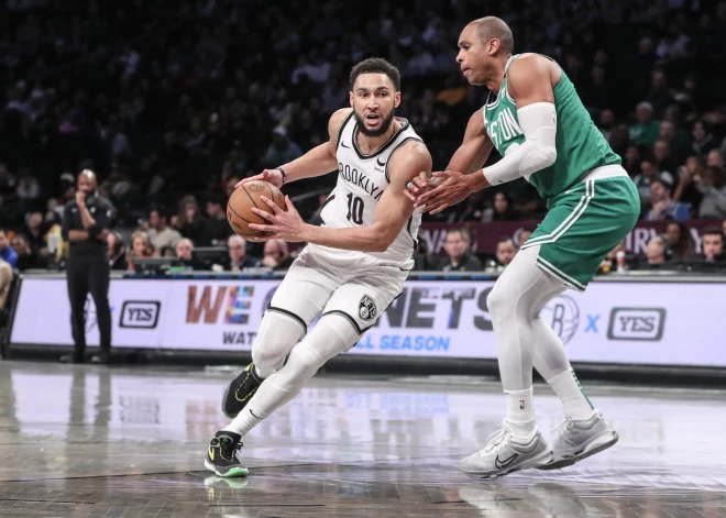 Feb 13, 2024; Brooklyn, New York, USA;  Brooklyn Nets guard Ben Simmons (10) drives past Boston Celtics center Al Horford (42) in the third quarter at Barclays Center. Mandatory Credit: Wendell Cruz-USA TODAY Sports