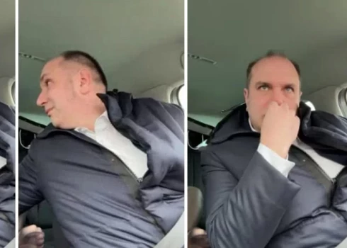 Madars Lasmanis, sēžot dienesta automašīnā, tiešsaistes sēdes laikā pamanījās arī apčamdīt aizmugurē sēdošu personu, kas daudziem izskatījās “pēc priekšspēles”.