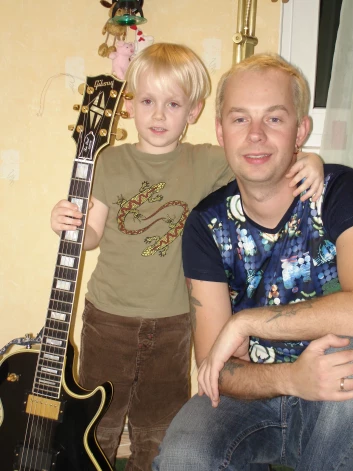 Fēlikss ar dēlu Ēriku Ķiģeli junioru 2006. gadā.