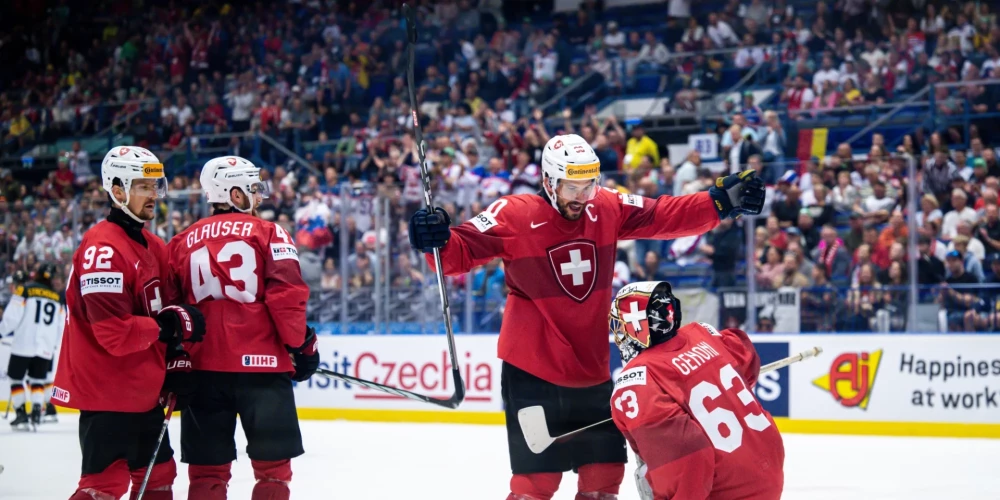 Šveice pieveic Vāciju un izcīna vietu pasaules hokeja čempionāta pusfinālā; cīņu turpina arī Kanāda