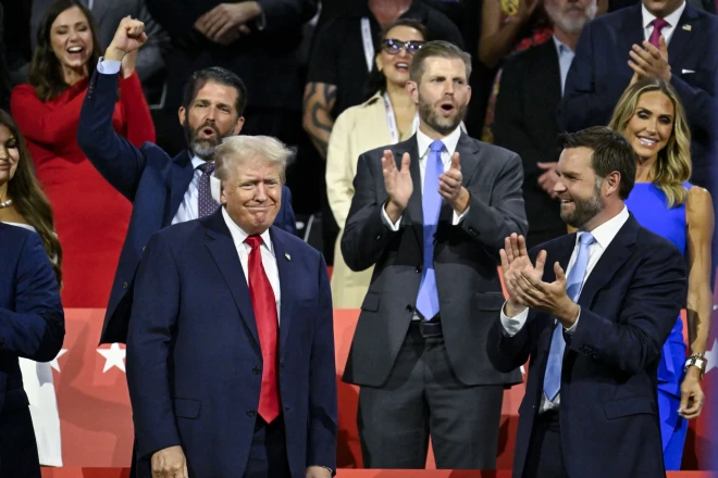 Дональд Трамп, Дональд Трамп-младший, Эрик Трамп и его жена Лара.