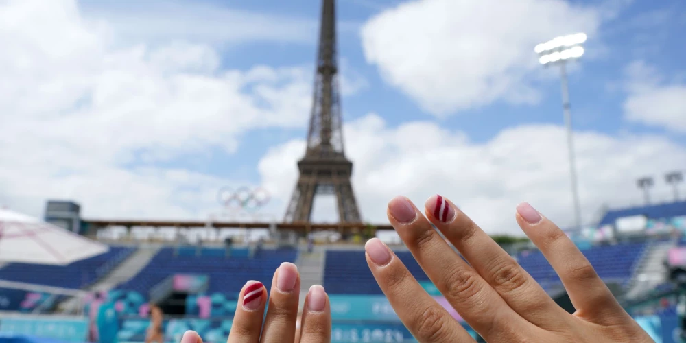 Pludmales volejbola sacensībām apstākļi ir lieliski un Latvijas karodziņi uz šī fona arī izskatās pasakaini.