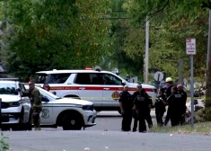 Likumsargi ieradušies, lai kaķim atņemtu granātu (foto: WKRC-TV / Facebook)