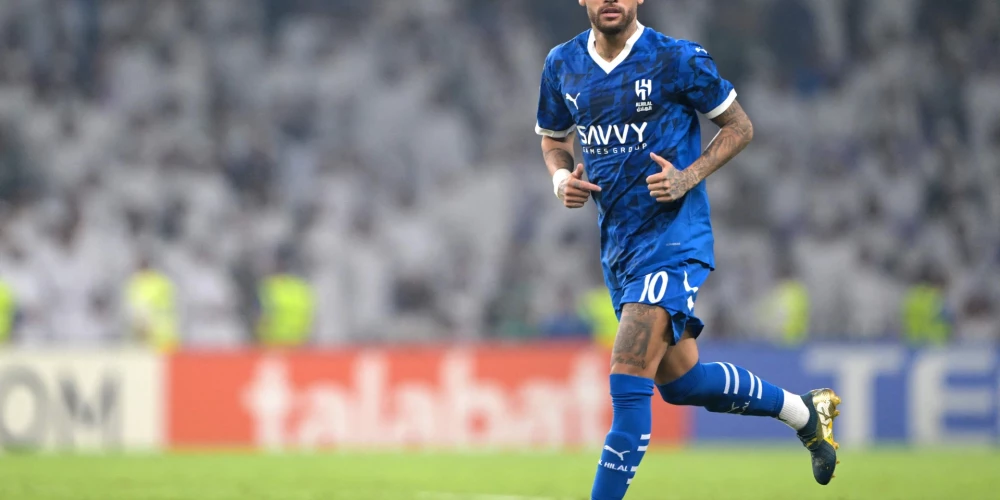 Hilal's Brazilian forward #10 Neymar runs on the pitch during the AFC Champions League group B football match between UAE's Al-Ain and Saudi's Al-Hilal at the Hazza bin Zayed Stadium in al-Ain on October 21, 2024. (Photo by AFP)