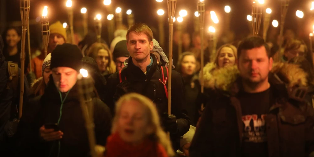 Во время факельного шествия в День Лачплесиса.