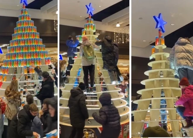 VIDEO: tikai dažas minūtes, un vairs nav nekā! "Akropole Rīga" cilvēki izlaupa no čipsu bundžām izveidotu eglīti