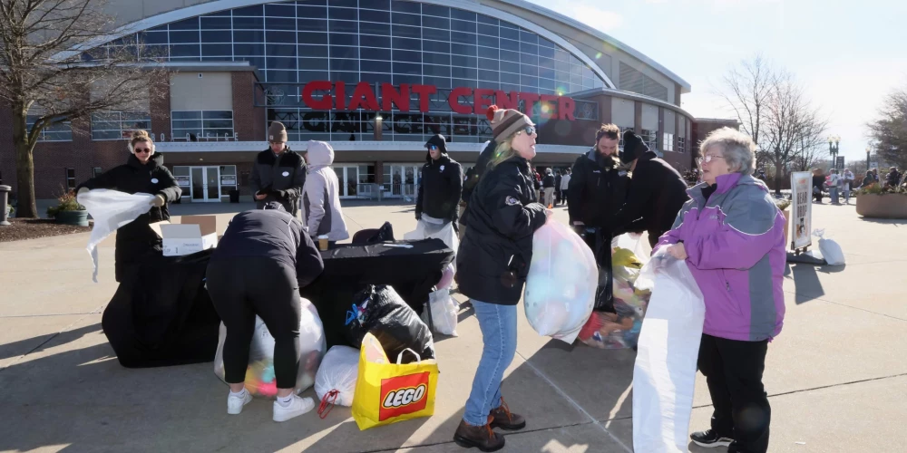 HERSHEY, PENNSYLVANIA - JANUARY 05: Volunteers pack up stuffed animals prior to the game between the Hershey Bears and the Providence Bruins at Giant Center on January 05, 2025 in Hershey, Pennsylvania. The GIANT Teddy Bear Toss game is held once a year with the bears being donated to 35 local charities.   Bruce Bennett/Getty Images/AFP (Photo by BRUCE BENNETT / GETTY IMAGES NORTH AMERICA / Getty Images via AFP)