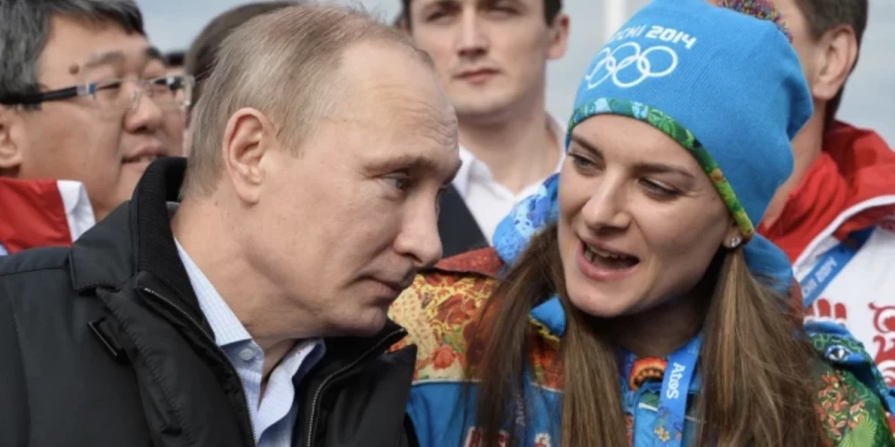 Vladimirs Putins un Jeļena Isinbajeva 2014. gada 5. februārī Sočos.