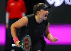 Tennis - Qatar Open - Khalifa International Tennis and Squash Complex, Doha, Qatar - February 14, 2025 Latvia's Jelena Ostapenko celebrates after winning her semi final match against Poland's Iga Swiatek REUTERS/Ibraheem Al Omari