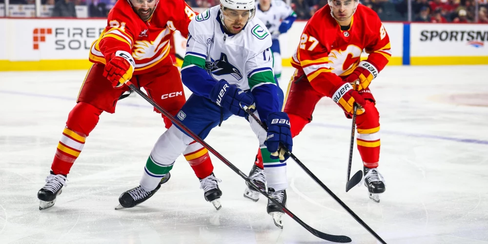 "Canucks" viesos ar rezultātu 4:3 (1:1, 1:2, 1:0, 0:0, 1:0) pēcspēles metienu sērijā uzvarēja Kalgari "Flames" komandu.